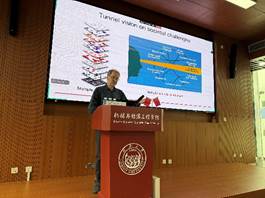 A person standing at a podium AI-generated content may be incorrect.